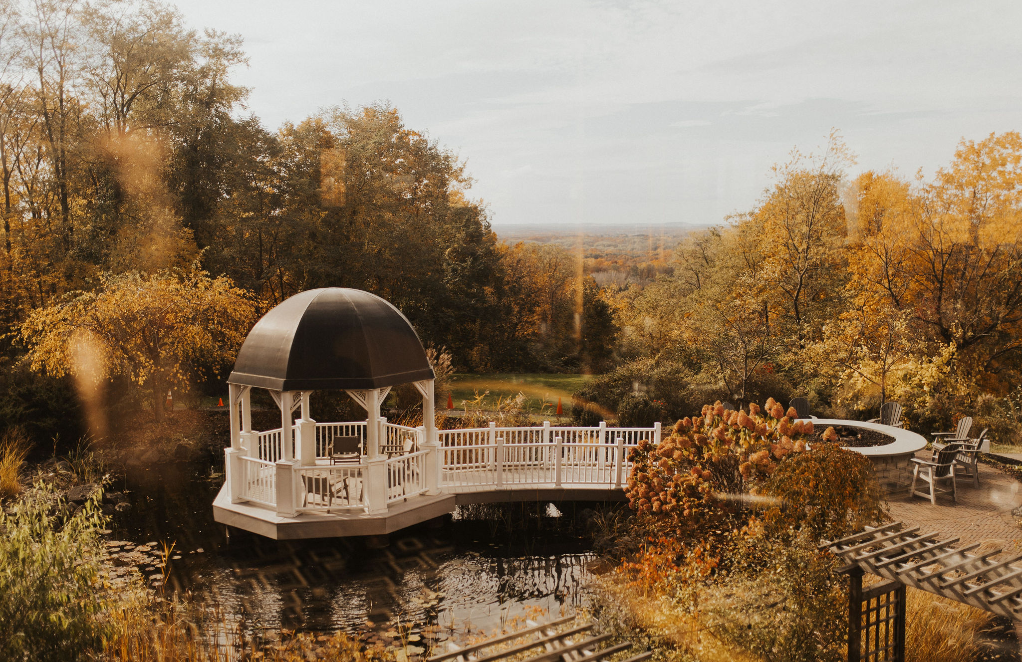 Woodcliff gazebo in fall White gazebo over the pond at Woodcliff Hotel & Spa surrounded by fall foliage